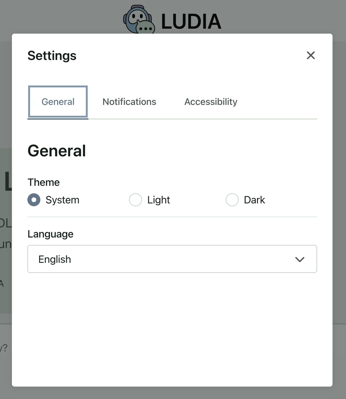 The Settings window with the General tab selected. The Language menu is set to English, with the Theme options shown above it.
