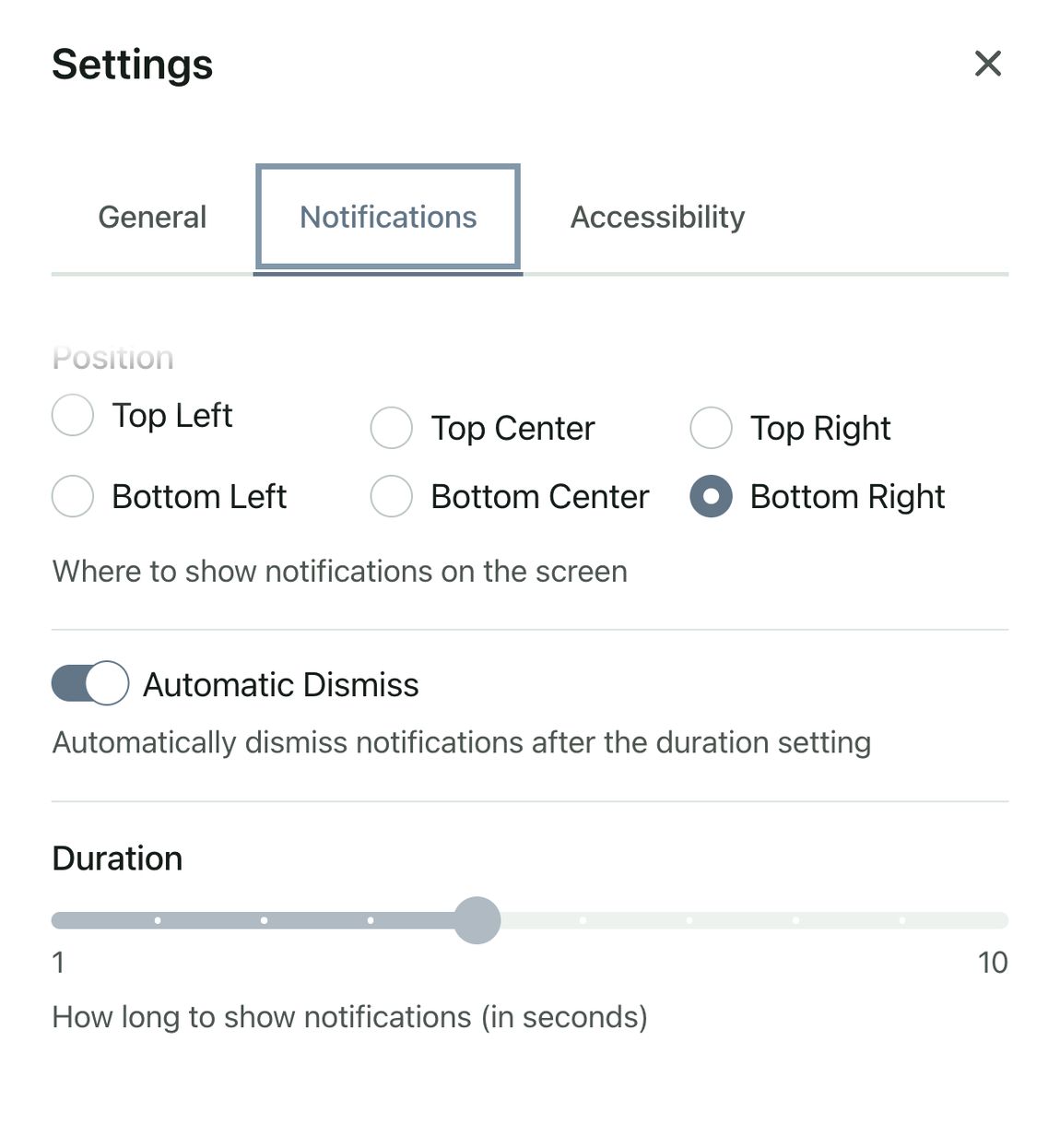 The Settings window with the Notifications tab selected. Position options are Top Left, Top Center, Top Right, Bottom Left, Bottom Center, and Bottom Right, with Bottom Right selected. The Automatic Dismiss switch is on, and a Duration setting is below.